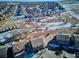 Aerial view of houses and a snow-dusted walking path at 10298 Tall Oaks Cir, Parker, CO 80134