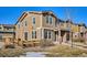 Two-story townhome with a fenced yard and landscaping at 10298 Tall Oaks Cir, Parker, CO 80134