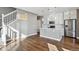 Modern kitchen with white cabinets and island at 10298 Tall Oaks Cir, Parker, CO 80134