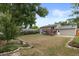 Spacious backyard featuring a deck and lush greenery, offering a serene outdoor space at 11823 Steele St, Thornton, CO 80233