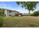 Large backyard featuring a deck and a mix of green space, perfect for outdoor enjoyment at 11823 Steele St, Thornton, CO 80233