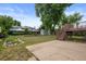 Exterior view of backyard, patio, deck, shed, garden, and grass at 11823 Steele St, Thornton, CO 80233