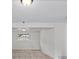 Finished basement with carpet, window, and drop ceiling at 11823 Steele St, Thornton, CO 80233