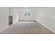 Finished basement has neutral carpet and lots of space at 11823 Steele St, Thornton, CO 80233