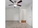 Bright bedroom with neutral carpeting and a doorway to another room at 11823 Steele St, Thornton, CO 80233