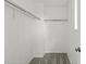 This walk-in closet features ample storage with shelving and neutral carpeting at 11823 Steele St, Thornton, CO 80233