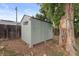 Storage shed in backyard offering secure storage at 11823 Steele St, Thornton, CO 80233