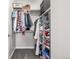 Well-organized walk-in closet with ample storage and shelving at 6777 Larsh Dr, Denver, CO 80221