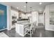 Modern kitchen with stainless steel appliances and island at 6777 Larsh Dr, Denver, CO 80221