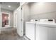 Convenient laundry room with washer and dryer at 6777 Larsh Dr, Denver, CO 80221