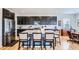 Eat in kitchen with granite counters, dark cabinets and stainless steel appliances at 15226 W 93Rd Ave, Arvada, CO 80007