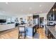 Modern kitchen with granite countertops and stainless steel appliances at 15226 W 93Rd Ave, Arvada, CO 80007