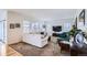Bright living room with natural light and comfortable seating at 15226 W 93Rd Ave, Arvada, CO 80007