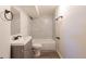 Modern bathroom featuring a vanity with sink and a tiled shower-tub combination, enhancing its appeal at 7111 Clermont St, Commerce City, CO 80022