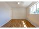 Bedroom with hardwood floors, closet and natural light at 7111 Clermont St, Commerce City, CO 80022