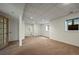 Large finished basement with carpet and two windows at 851 Racquet Ln, Boulder, CO 80303