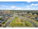 Stunning aerial view of a well-planned community, showcasing green spaces, tree-lined streets and neighborhood charm at 452 S Norfolk Ct, Aurora, CO 80017