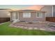 Backyard featuring manicured artificial lawn, and comfortable outdoor seating area at 452 S Norfolk Ct, Aurora, CO 80017