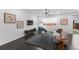 Inviting living room boasts stylish decor, modern ceiling fan, and plush rug at 452 S Norfolk Ct, Aurora, CO 80017