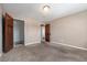 Cozy bedroom offers neutral walls, plush carpeting, and a door leading to a closet at 5721 W 92Nd Ave # 96, Westminster, CO 80031