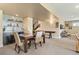 Basement with a dining area, bar, and entertainment space for versatile living at 10826 Evergold Way, Highlands Ranch, CO 80126