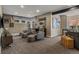 Finished basement featuring a home theater area with comfortable seating and a 