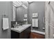 Chic bathroom with a modern vanity, sleek mirror, and stylish gray color scheme at 21859 Grandview Ave, Golden, CO 80401