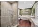 Spa-like bathroom with glass shower, soaking tub and modern fixtures at 21859 Grandview Ave, Golden, CO 80401