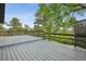 Expansive wooden deck with scenic treetop views, perfect for outdoor entertaining at 21859 Grandview Ave, Golden, CO 80401