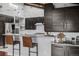 Modern kitchen with sleek cabinetry, granite countertops, and stainless steel appliances at 21859 Grandview Ave, Golden, CO 80401