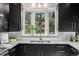 Charming kitchen with bay window, sleek countertops and ample natural light at 21859 Grandview Ave, Golden, CO 80401