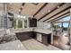 Bright, modern kitchen with sleek countertops and views to adjacent dining area at 21859 Grandview Ave, Golden, CO 80401