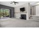 A cozy living room with a fireplace and patio access, perfect for entertaining or relaxing at 21859 Grandview Ave, Golden, CO 80401