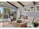 Bright living room with vaulted ceilings, a comfortable seating area, and natural light at 21859 Grandview Ave, Golden, CO 80401