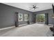 Spacious living room provides serene views from windows and sliding glass doors to outdoor spaces at 21859 Grandview Ave, Golden, CO 80401