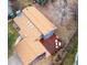 Stunning aerial view of home featuring a new roof, skylights, a yellow door, and a deck with white chairs at 901 Delphi Dr, Lafayette, CO 80026