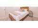 Bright bedroom featuring a wood bed frame, plush pillows, and decorative accents for a cozy feel at 901 Delphi Dr, Lafayette, CO 80026