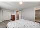 Comfortable bedroom with ensuite bathroom and closet offering ample space at 13367 W Montana Pl, Lakewood, CO 80228