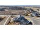 Spacious, attractive home with solar panels, a pergola-covered patio, and a beautifully landscaped yard in a Gathering-friendly neighborhood at 885 Delechant Dr, Erie, CO 80516