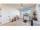 Bright bedroom with a ceiling fan, a standing desk, and good natural light at 885 Delechant Dr, Erie, CO 80516