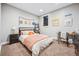 Bright bedroom featuring a cozy bed, a ladder bookshelf, and a small desk near a window at 3039 N Milwaukee St, Denver, CO 80205