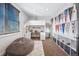 Fun bedroom featuring a lofted bed with desk space below at 3039 N Milwaukee St, Denver, CO 80205