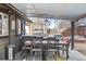 Covered outdoor kitchen with dining area, grill, and ample counter space at 3039 N Milwaukee St, Denver, CO 80205