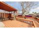 Outdoor patio with seating area and colorful yard decor, creating a charming backyard retreat at 4922 S Rifle Ct, Aurora, CO 80015