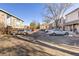 On-site parking area serving all units in the apartment building at 1310 N Corona St # A, Denver, CO 80218