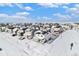 Aerial view of a residential neighborhood with houses covered in snow at 24281 E 40Th Ave, Aurora, CO 80019