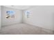 Spacious bedroom with neutral carpeting and large windows at 24281 E 40Th Ave, Aurora, CO 80019