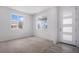 Cozy living room with neutral carpeting and large windows at 24281 E 40Th Ave, Aurora, CO 80019