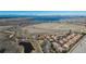 Expansive aerial shot featuring a neighborhood near a large body of water, highlighting natural beauty and residential living at 4648 S Abilene Cir, Aurora, CO 80015