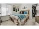 Bedroom with a comfortable bed, modern artwork, and convenient closet space at 4648 S Abilene Cir, Aurora, CO 80015